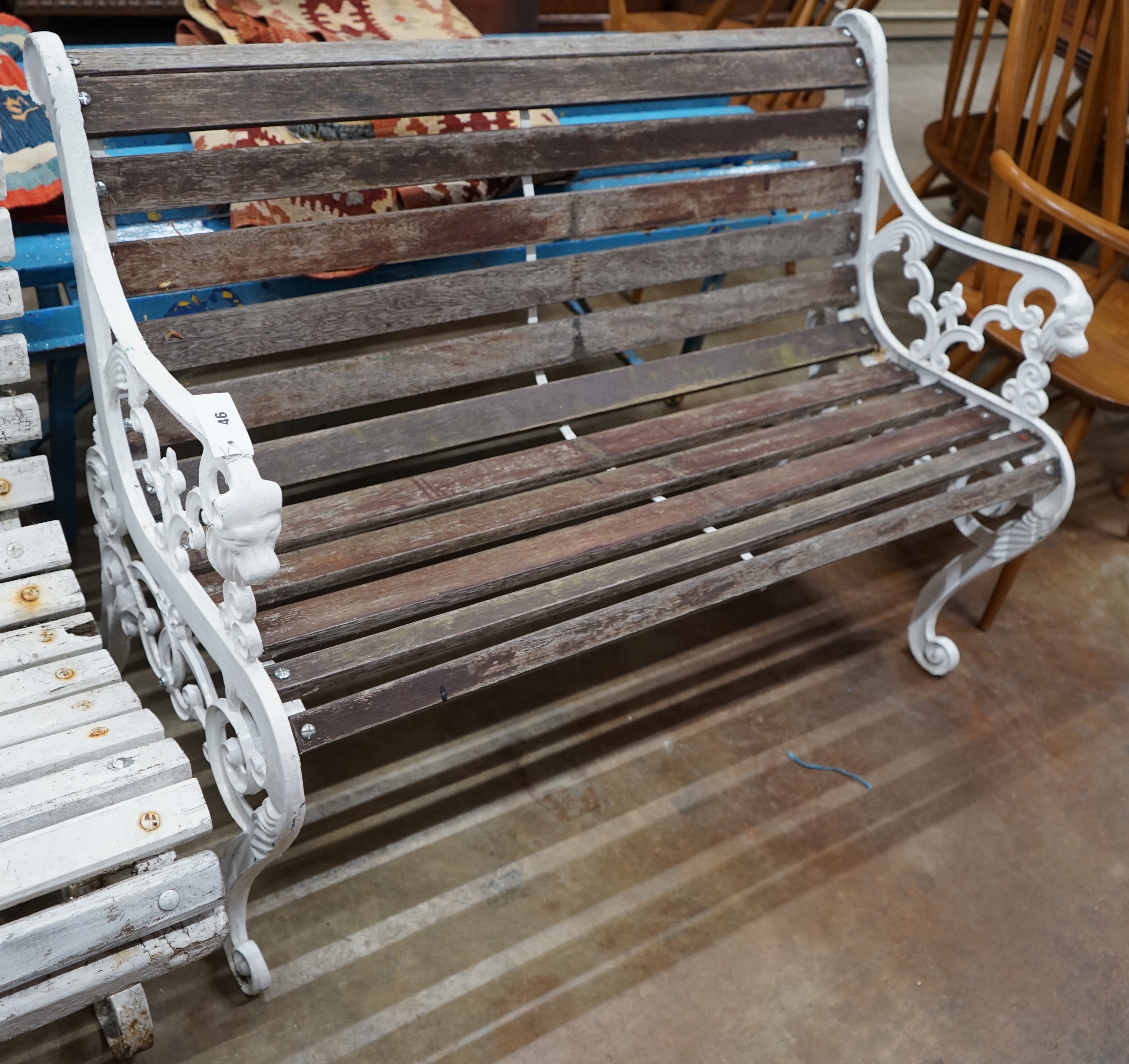 A Victorian style painted slatted wood garden bench, length 117cm width 60cm height 78cm
